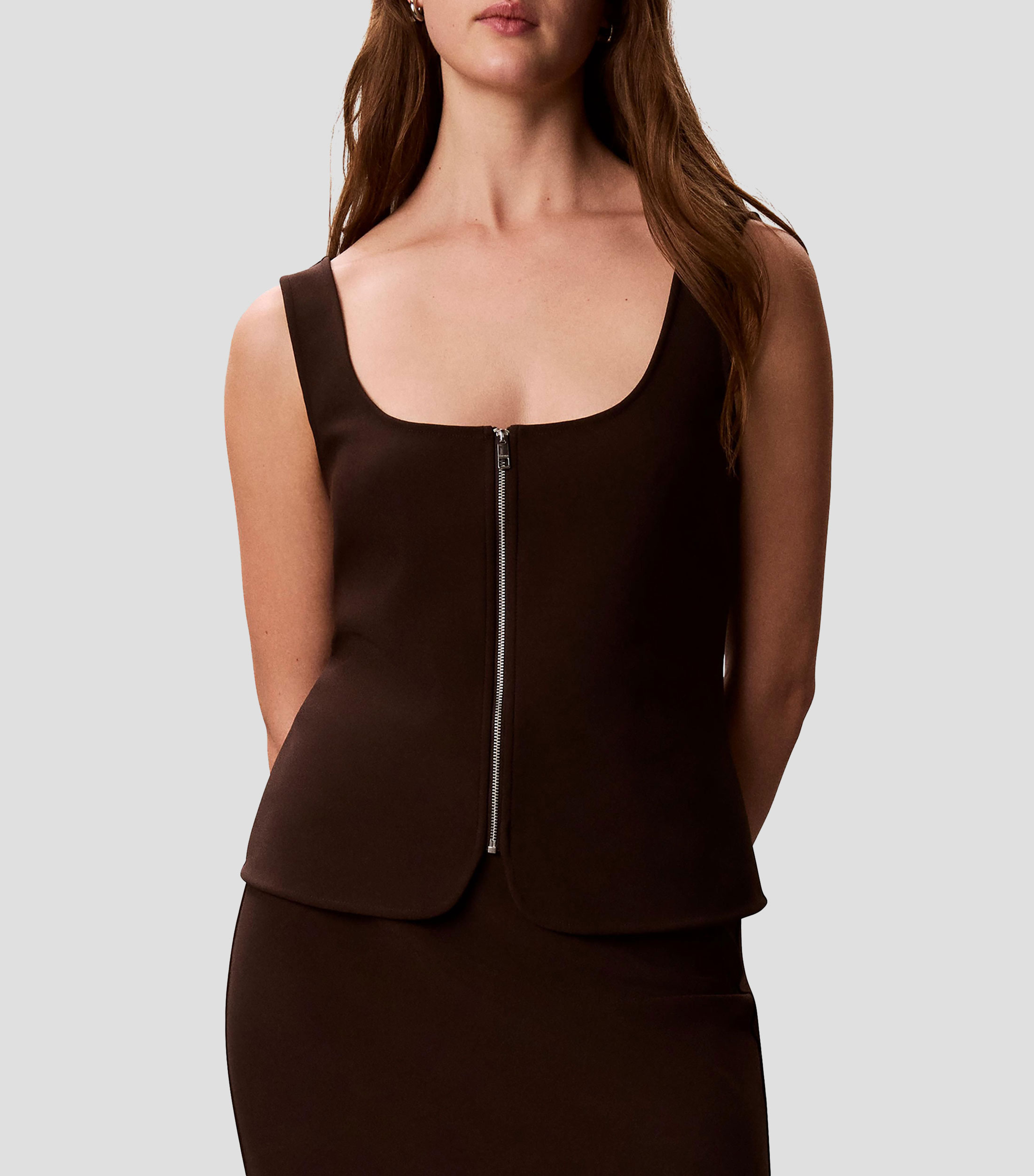Blusa lisa sin mangas Mujer